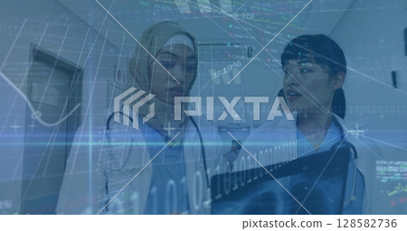 Image of data processing over two diverse female doctors Image of data processing over two diverse female doctors 128582736