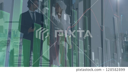 Image of financial data processing over two diverse business people 128582899