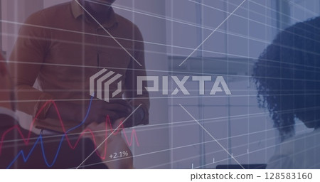 Image of financial data and graphs over happy diverse businesspeople talking in office 128583160