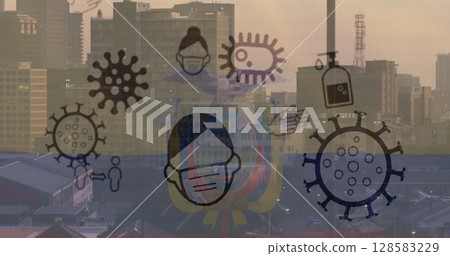 Urban skyline showing Ecuadorian flag overlay at dusk, with coronavirus icons and sanitizer bottle 128583229