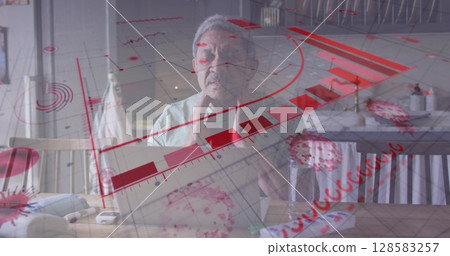 Image of financial data and virus cells over sad biracial senior man sitting at home Image of financial data and virus cells over sad biracial senior man sitting at home 128583257