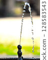 Drinking water from the tap in the park 128583543