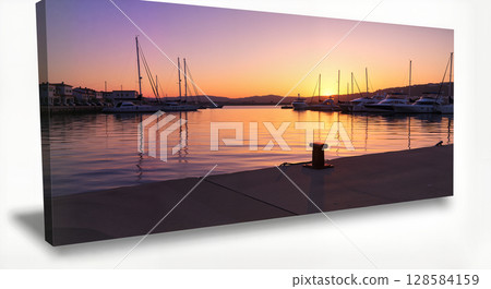 Sunset over marina with yachts and calm waters 128584159