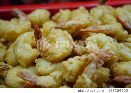 Golden Fried Shrimp Close-Up, Crispy Seafood Delight Golden Fried Shrimp Close-Up, Crispy Seafood Delight 128584300