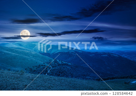 discover the beauty of mountain landscape in summer at night. majestic view of alps in full moon light. picturesque tourism destination for adventure and recreation discover the beauty of mountain landscape in summer at night. majestic view of alps in full moon light. picturesque tourism destination for adventure and recreation 128584642