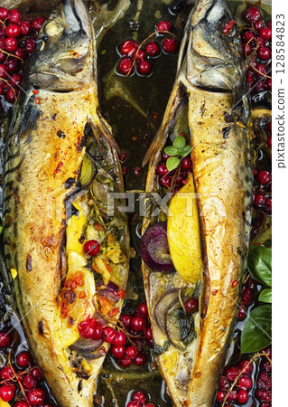 Baked mackerel fish with berries, seafood 128584823