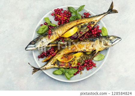 Baked mackerel fish with berries, seafood Baked mackerel fish with berries, seafood 128584824