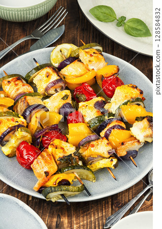 Fish shashlik with vegetables. 128584832