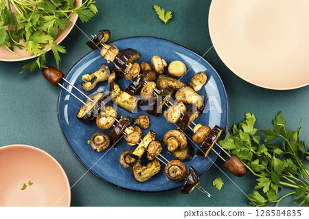 Delicious vegan kebabs, barbecue vegetables. Delicious vegan kebabs, barbecue vegetables. 128584835