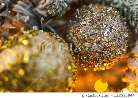 Merry Christmas Xmas happy holidays. Golden silver ornament decoration ball, defocused garland lights on classic decorated Christmas tree. Christmas tree with frosty ornaments. Christmas eve at home Merry Christmas Xmas happy holidays. Golden silver ornament decoration ball, defocused garland lights on classic decorated Christmas tree. Christmas tree with frosty ornaments. Christmas eve at home 128585944