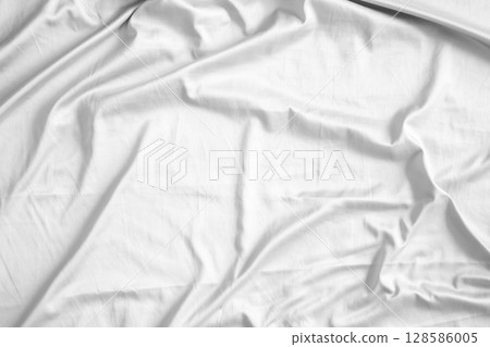 Abstract white wrinkled bedding sheet fabric texture background Abstract white wrinkled bedding sheet fabric texture background 128586005
