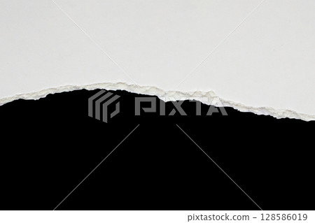White ripped paper torn edges strips isolated on black background White ripped paper torn edges strips isolated on black background 128586019