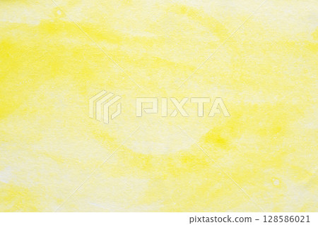 Abstract yellow watercolor background texture close up 128586021