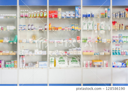 Pharmacy drugstore shelves interior blur medical background Pharmacy drugstore shelves interior blur medical background 128586190