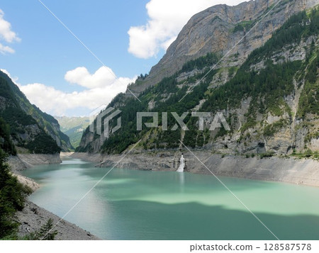 Emerald green Lake Gigerwald (Canton of St. Gallen, Switzerland) Emerald green Lake Gigerwald (Canton of St. Gallen, Switzerland) 128587578