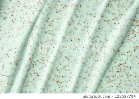 The texture of a mint body scrub with particles. Close-up 128587794