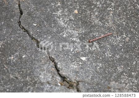 Nails on the ground Nails on the ground 128588473