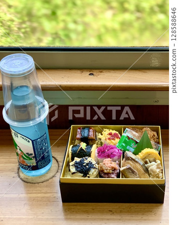 Scenery from the train window and ekiben (Ibusuki Tamatebako Bento and Ibusuki Onsen Cider) (Limited Express Ibusuki Tamatebako/JR Kyushu Ibusuki Makurazaki) Scenery from the train window and ekiben (Ibusuki Tamatebako Bento and Ibusuki Onsen Cider) (Limited Express Ibusuki Tamatebako/JR Kyushu Ibusuki Makurazaki) 128588646