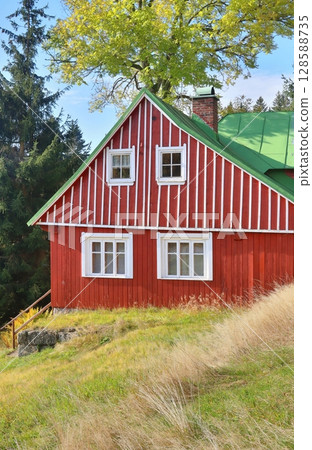 Beautiful wooden cottage in Czech republic 128588735