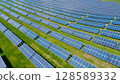Rows of solar panels on a green meadow in Greece. 128589332
