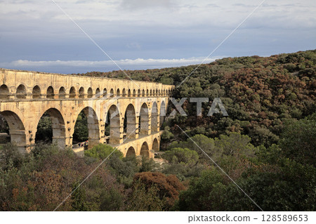 Exploring the stunning Pont du Gard aqueduct bridge in southern France Exploring the stunning Pont du Gard aqueduct bridge in southern France 128589653
