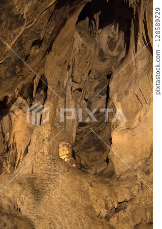 Rock formations of Betharram caves in France during a serene midday excursion Rock formations of Betharram caves in France during a serene midday excursion 128589729