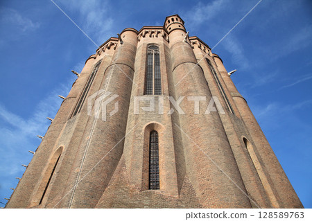 Sainte-Secile cathedral brick architecture in Albi, France under a clear blue sky 128589763