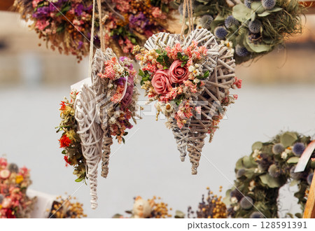 Handmade heart decorations with dried flowers Handmade heart decorations with dried flowers 128591391