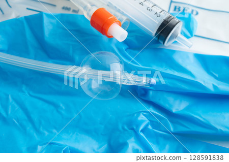 Foley catheter and urine drainage bag collect urine for disability or patient in hospital. 128591838