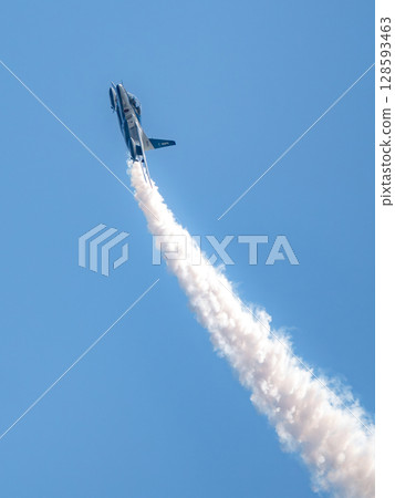 Blue Impulse flying in the blue sky Blue Impulse flying in the blue sky 128593463