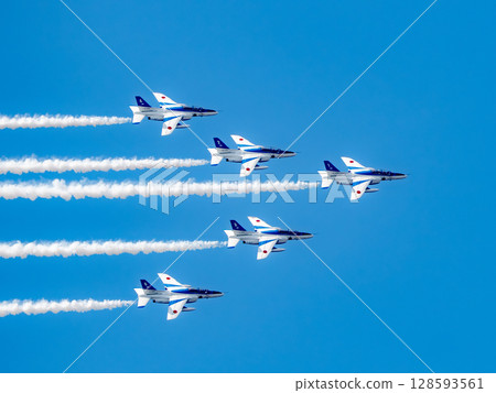 Blue Impulse flying in the blue sky Blue Impulse flying in the blue sky 128593561