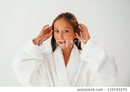 Cheerful, with eye patches. Conception of beauty and self care. Young girl is in the studio Cheerful, with eye patches. Conception of beauty and self care. Young girl is in the studio 128593870