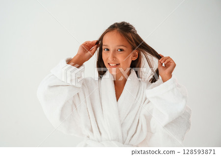 Cheerful, with eye patches. Conception of beauty and self care. Young girl is in the studio Cheerful, with eye patches. Conception of beauty and self care. Young girl is in the studio 128593871