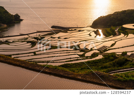 Nagasaki Prefecture: Tsuchiya rice terraces at dusk - a pristine Japanese landscape 128594237