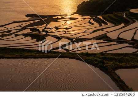 Nagasaki Prefecture: Tsuchiya rice terraces at dusk - a pristine Japanese landscape 128594260