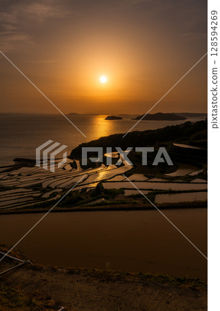 Nagasaki Prefecture: Tsuchiya rice terraces at dusk - a pristine Japanese landscape 128594269