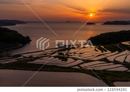 Nagasaki Prefecture: Tsuchiya rice terraces at dusk - a pristine Japanese landscape 128594291