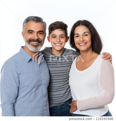 Family Portrait of a Smiling Couple and Their Son Against a Simple Background 128595986