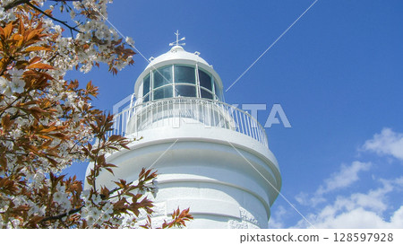 Himeshima Lighthouse and cherry blossoms Himeshima Lighthouse and cherry blossoms 128597928