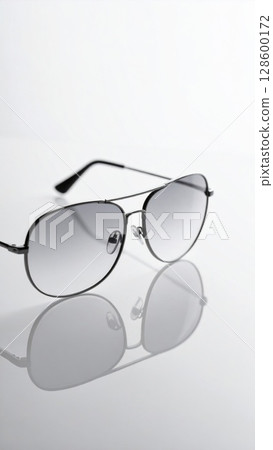 Grey Aviator Sunglasses on White Background 128600172