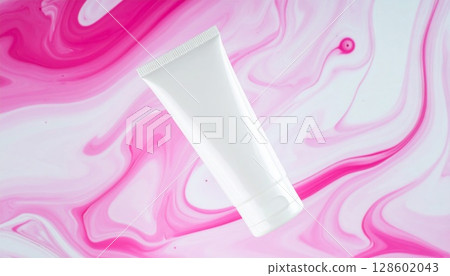 White Cosmetic Tube on Pink Marble Swirl Background 128602043