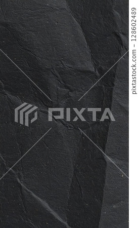 Black rough paper texture, close view paper pattern background 128602489