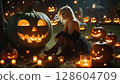 Halloween pumpkin and little girl 128604709