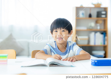 Elementary school student to study Elementary school student to study 128604775