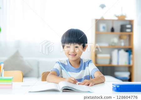 Elementary school student to study Elementary school student to study 128604776