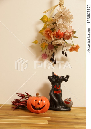 Create a Halloween image with artificial flower swags Create a Halloween image with artificial flower swags 128605173