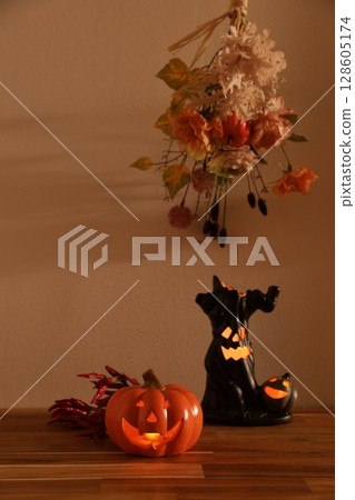 Create a Halloween image with artificial flower swags Create a Halloween image with artificial flower swags 128605174