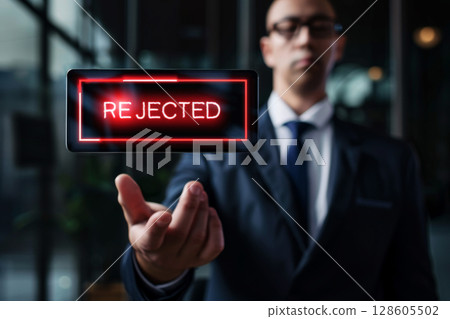A businessman in a dark blue suit points at rejected notification sign . Generative AI 128605502