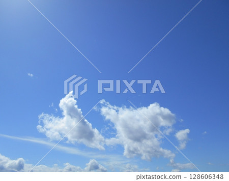 White clouds floating in the blue sky 128606348