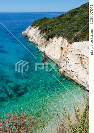 crystal clear pool in the corner of Filikuri beach in Himara, Albanian Riviera. High angle 128607041